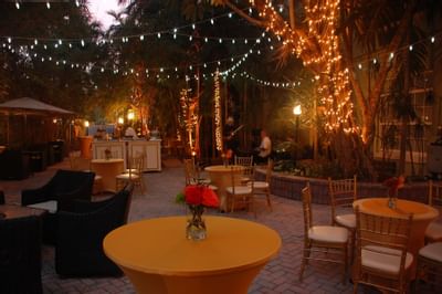 outside terrace with lights and dining tables