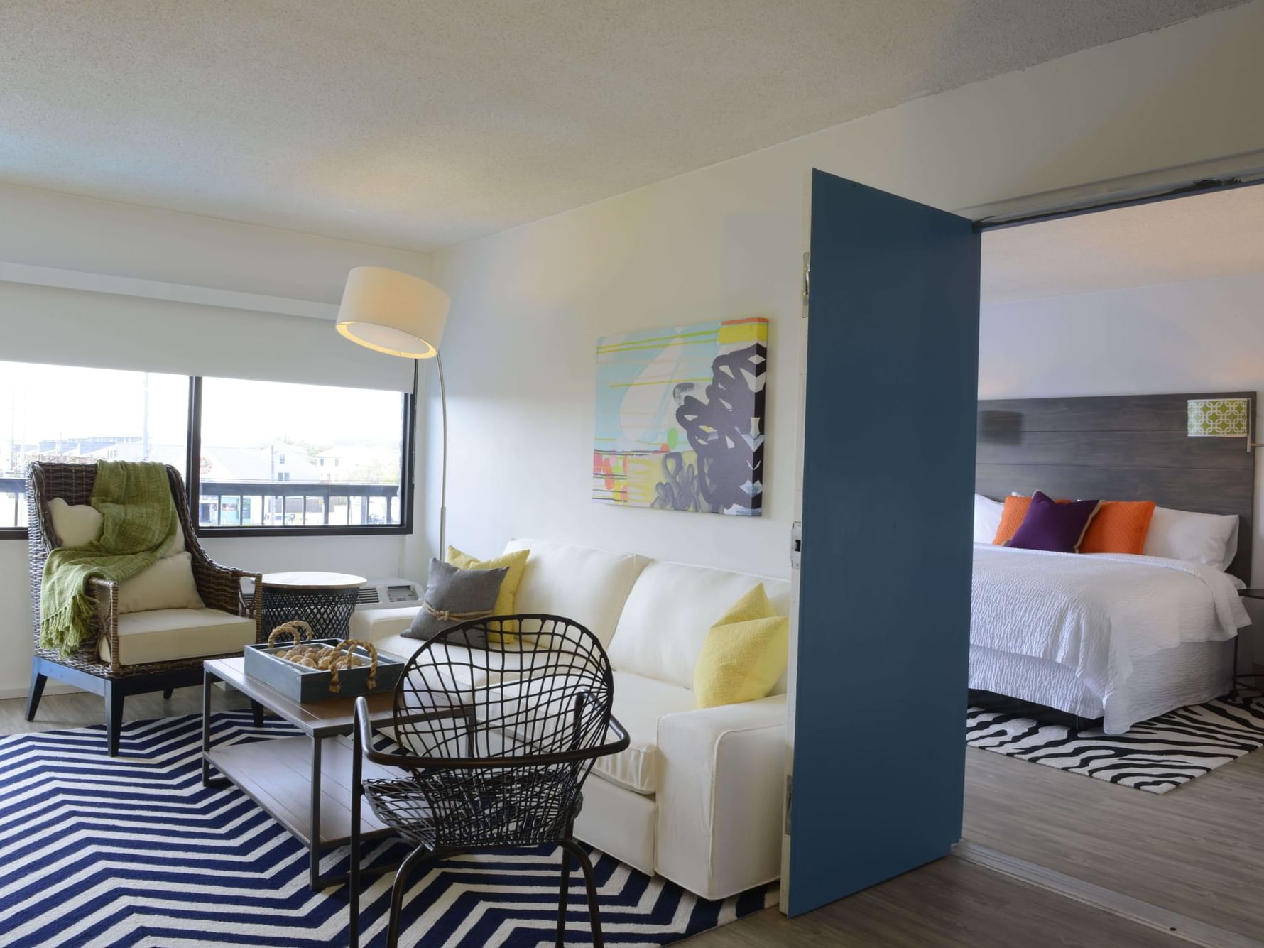 Living & bedroom area in King Suite at Beach House Dewey