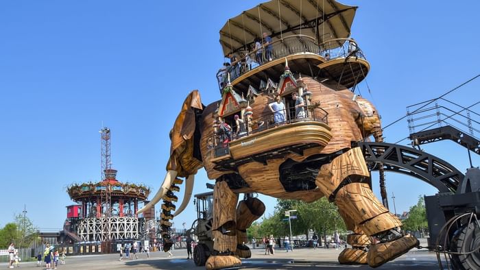 A big elephant statue in Les Machines near The Originals Hotels