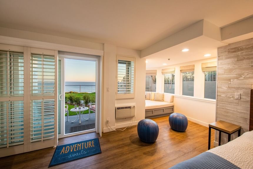 Hotel suite with bay window and ocean view