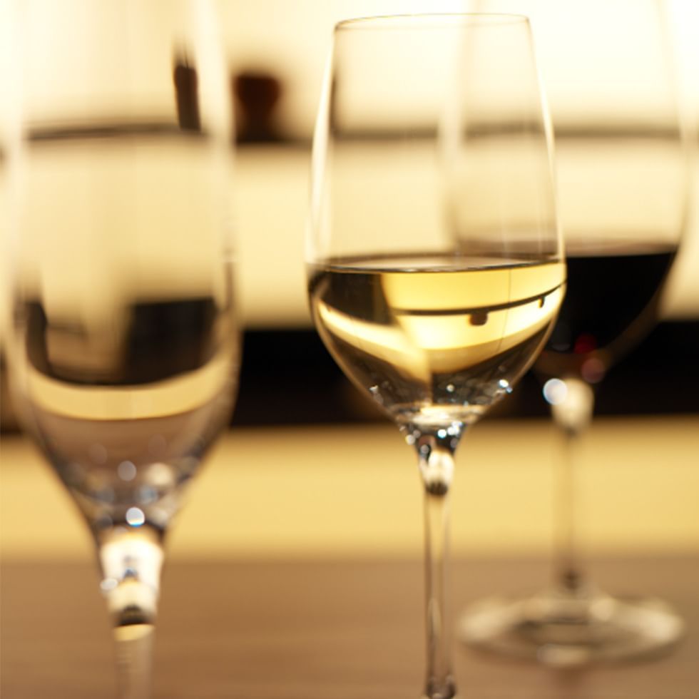 Glasses of wine on a table showcasing a wine tasting event.