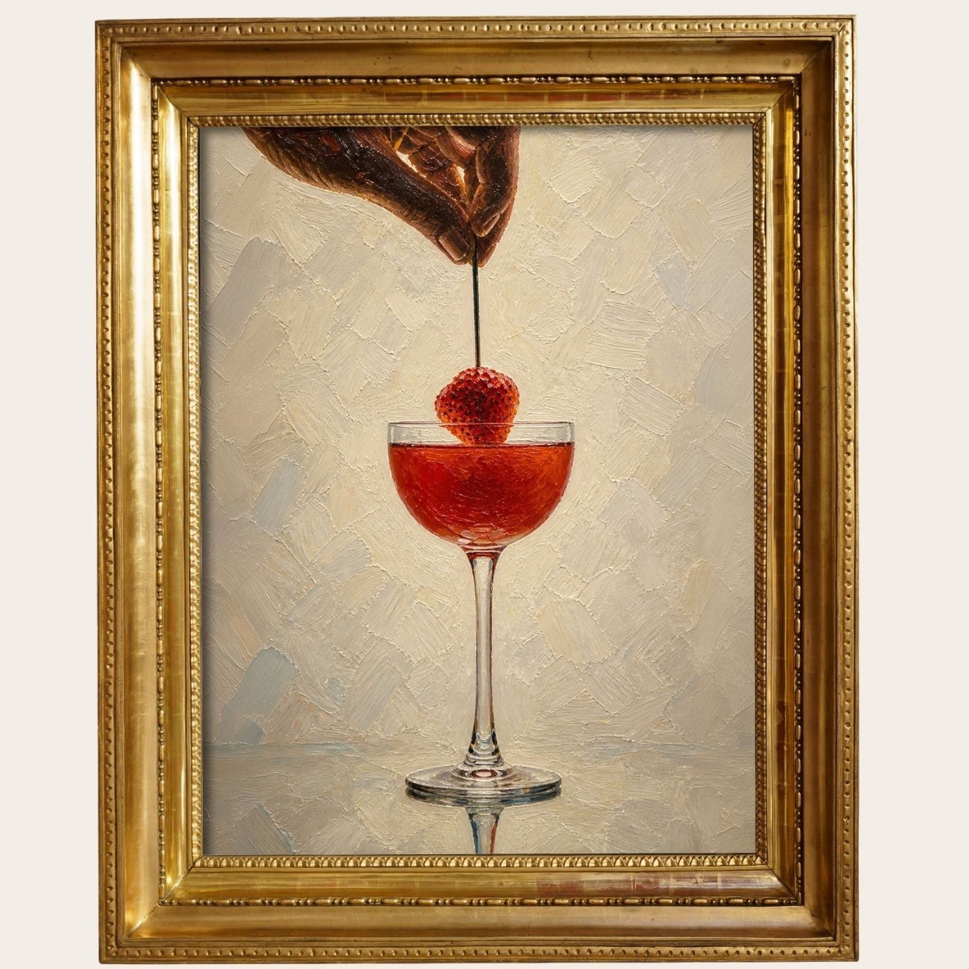 Hand places a strawberry on a cocktail glass in an artistic painting at The Londoner