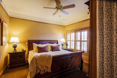 Bed & nightstand in Herrington Suite, The Herrington Inn & Spa