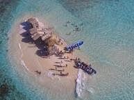 Aerial view of Cayo Arena beach near BlueJack Tar Hotel