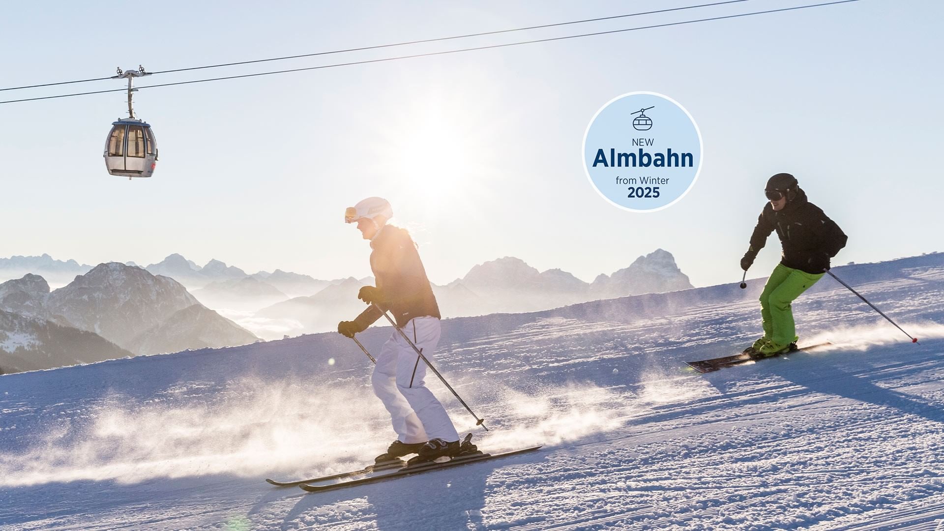 Two skiers on a snowy slope with a cable car and 