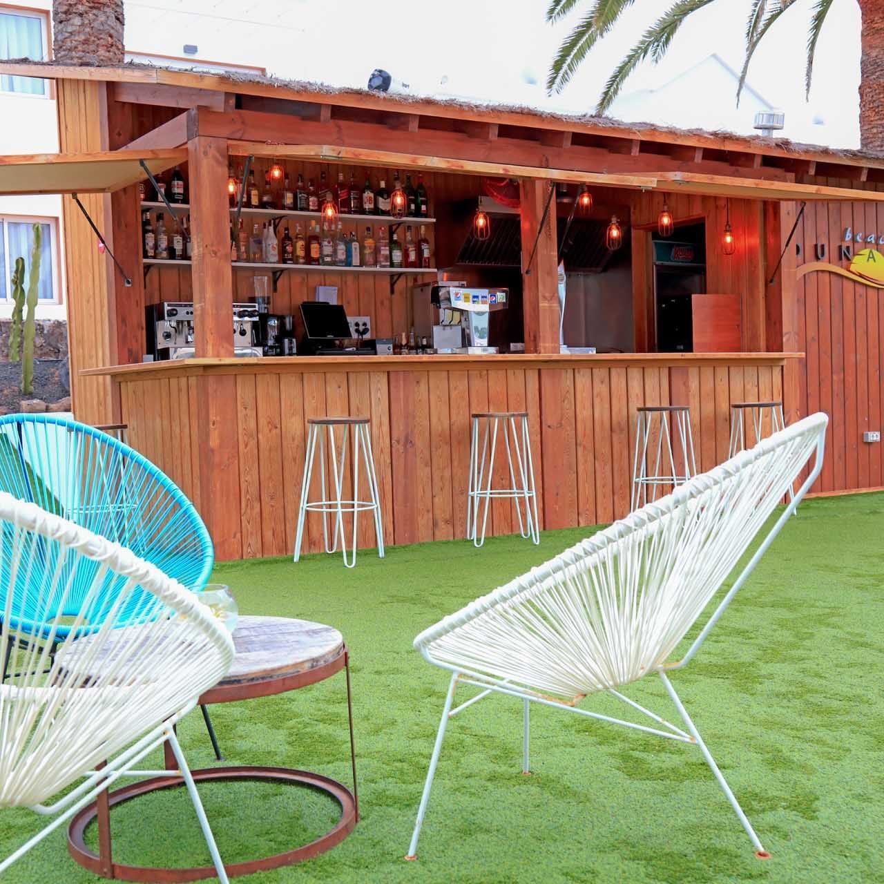 Coco Bar's frontal string chairs at Labranda Corralejo Village