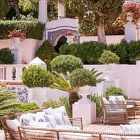 Outdoor sitting area at Villa del Mar in Marbella Club Hotel