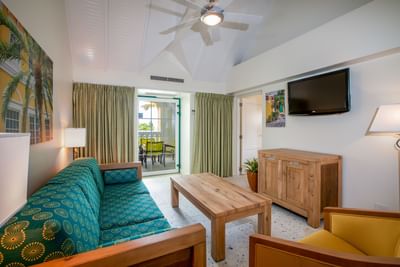 Living room with modern interior & decor in Two Bedroom Suite at Amsterdam Manor Beach Resort