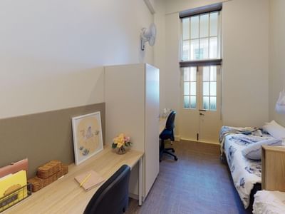 Twin Room with two beds, two desks and balcony at UniLodge Herston.
