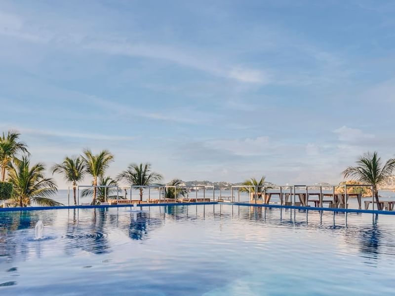 Swimming pool with sea view at FA Hotels & Resorts