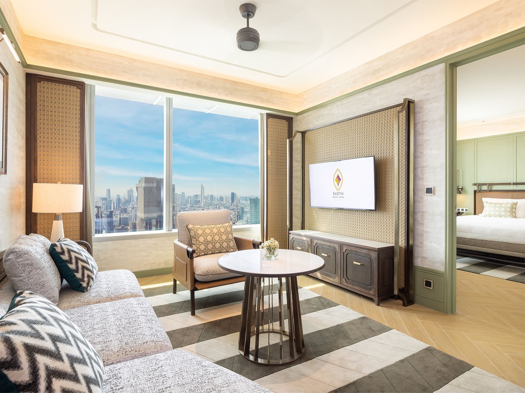 Living area in 1-Bedroom Suite at Eastin Grand Hotel Phayathai