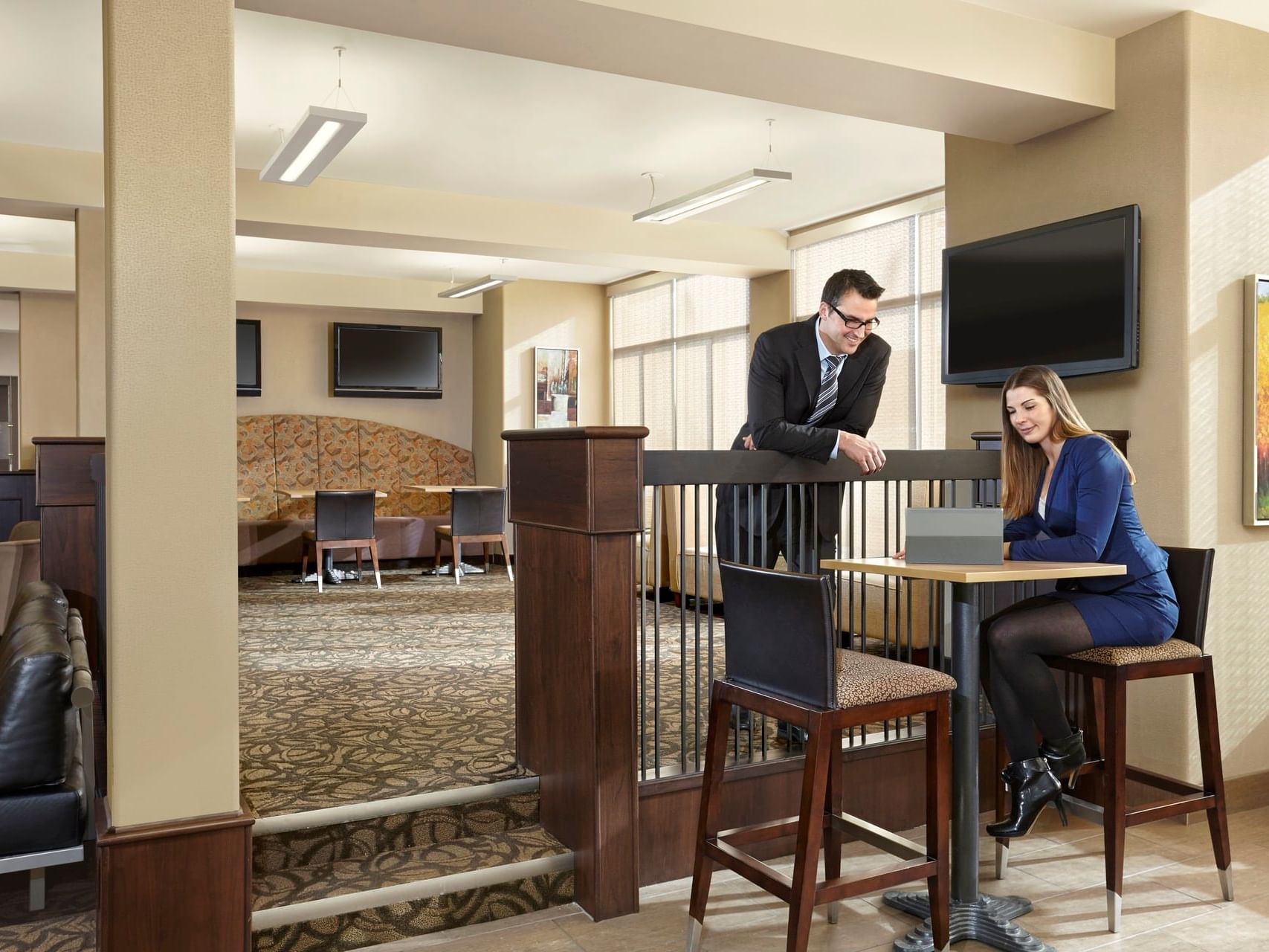The interior of the Business Center at Clique Hotels & Resorts