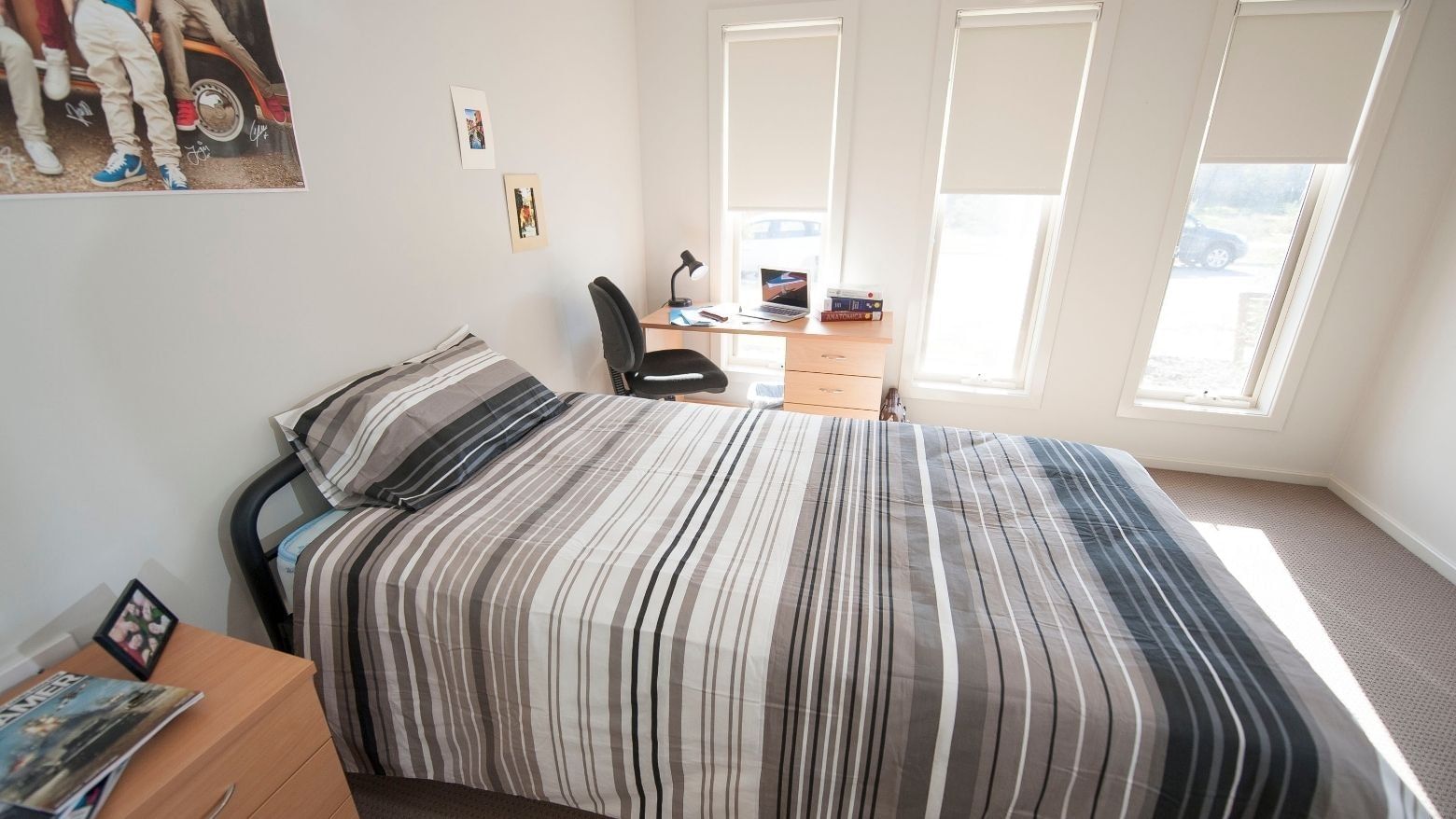 Neat room with bed, desk, and window at La Trobe University Regional Housing – Shepparton.