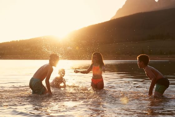 Children playing in the lake near The Lodge at Schroon Lake