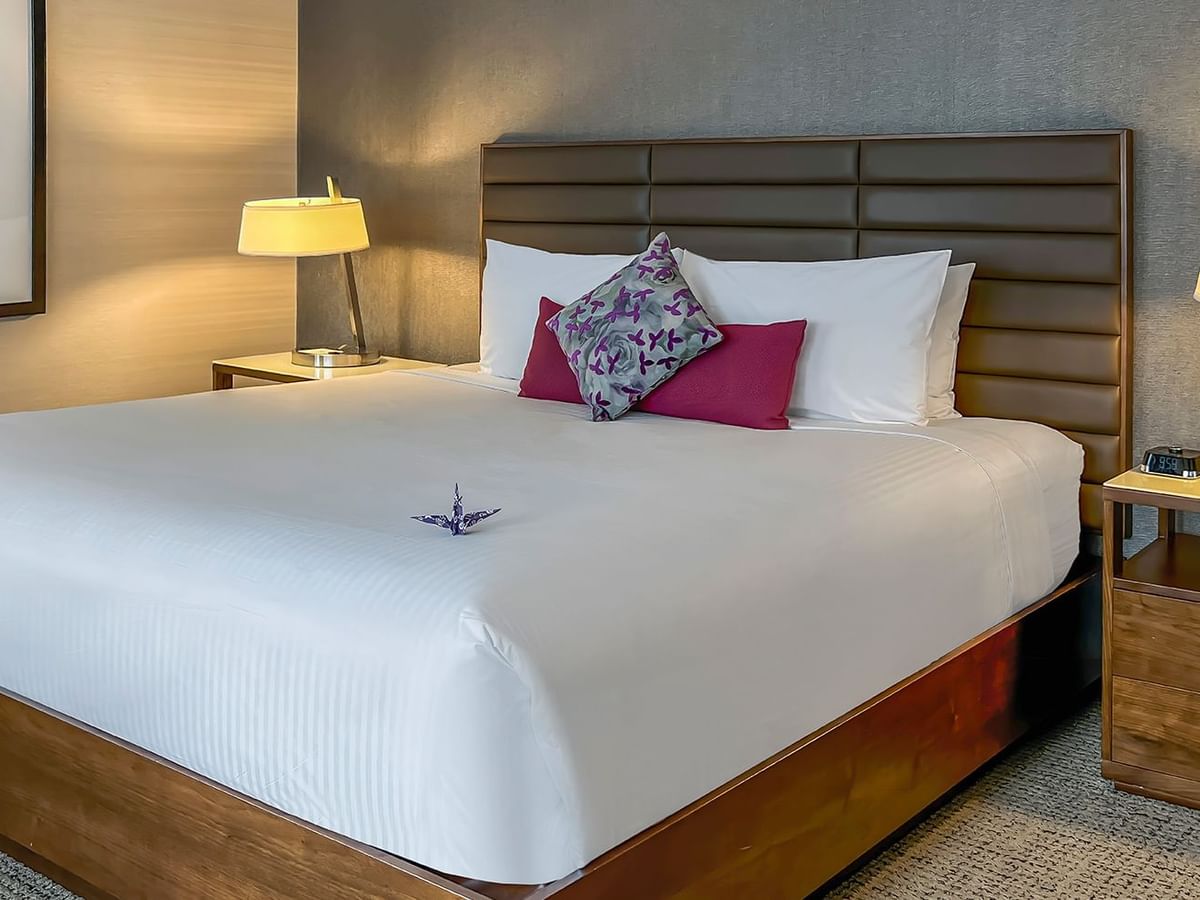 Hotel bed with nightstands and lamps