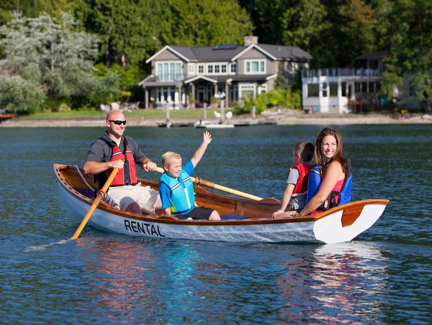 Family on a skiff family boat near Alderbrook Resort & Spa