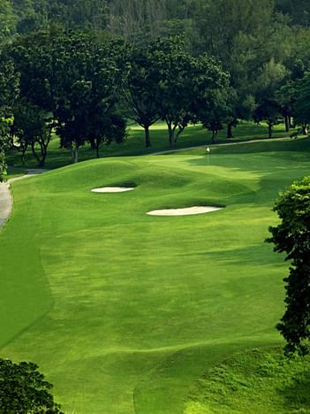 View of The Palm Course near The Saujana Hotel Kuala Lumpur with rolling greens and sand traps