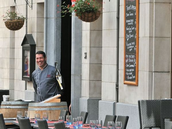 Chutney Chef smiles near the restaurant at Warwick Brussels