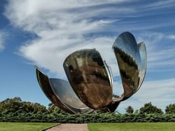 A distant view of Floralis Genérica near Recoleta Grand Hotel