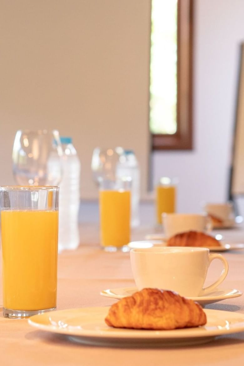 Croissant breads & orange juices served at Club Hemingway