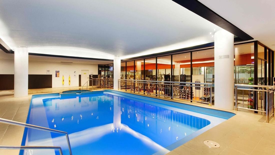 Swimming pool near the fitness lounge at Pullman Albert Park