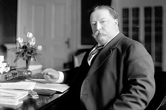 President William Howard Taft sitting at desk at Hotel Colorado