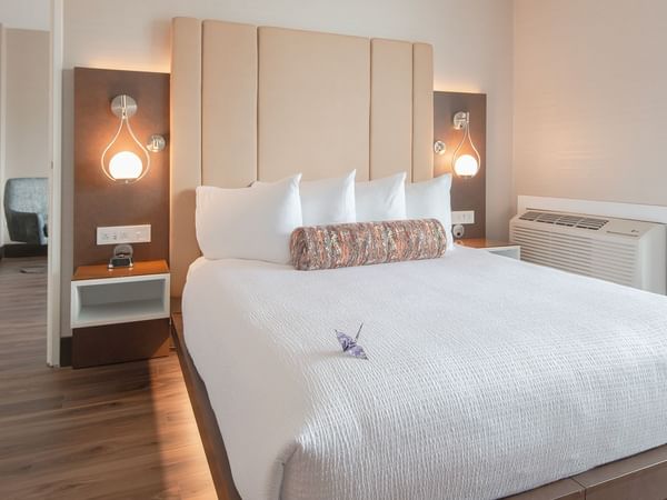 Hotel guestroom with a queen size bed 