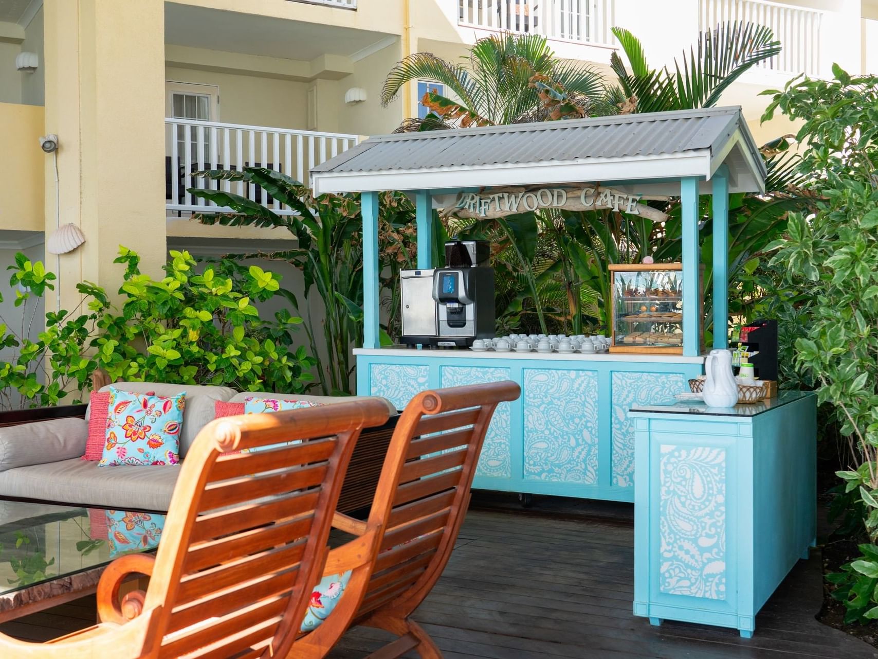 Outdoor seating area in Driftwood cafe at  Sugar Bay Barbados