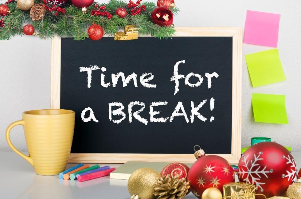 What Is Twixmas Explained featuring a festive Time for a break Sign