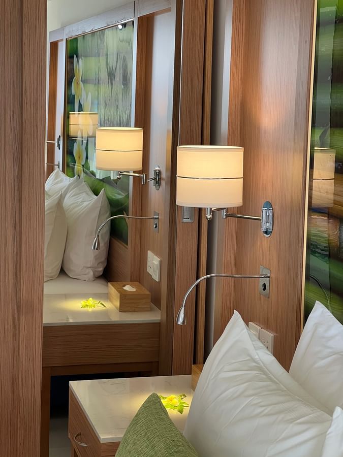 Elegant room with wooden furniture and soft lighting at Warwick Le Lagon Efate.