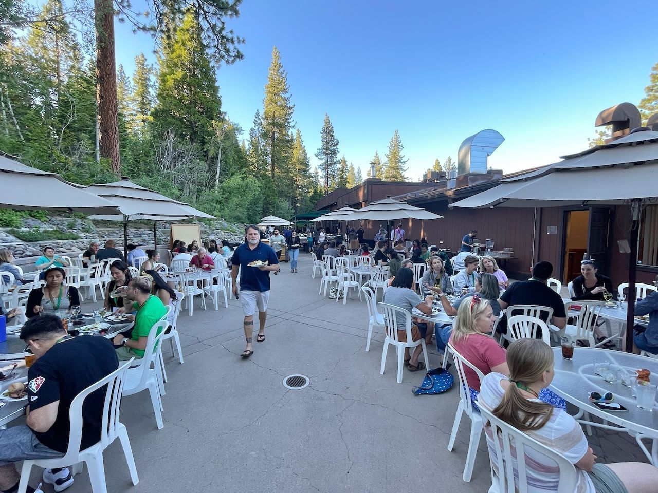 Outdoor dinner on Garden Deck with people at tables