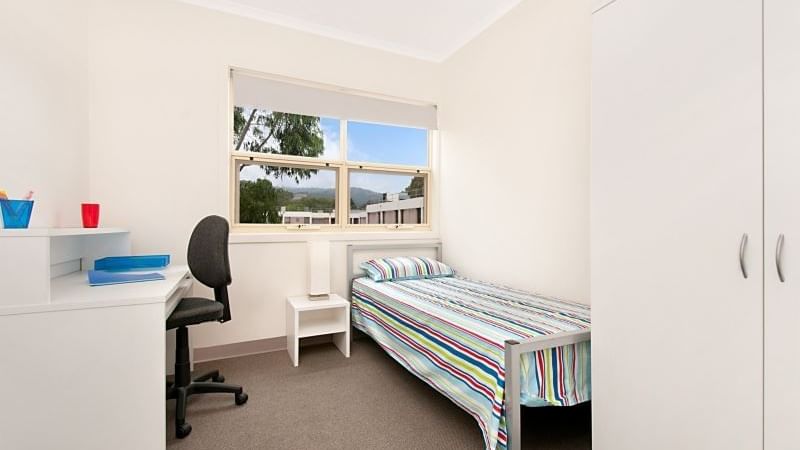 Student Living – Magill Apartments with Bedroom with study desk and wardrobe