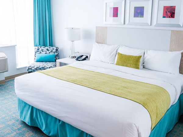 queen bed in a guest room