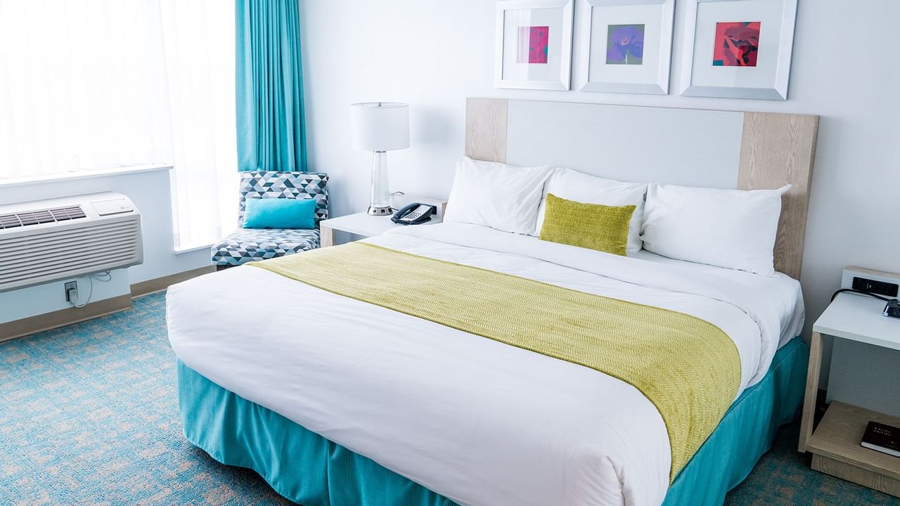 queen bed in a guest room