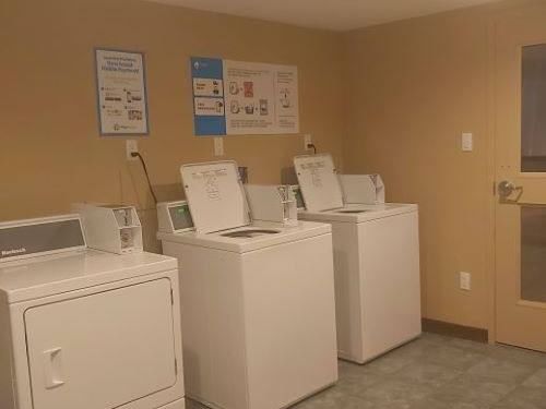 Laundry Machines placed in the launderette at Blackcomb Springs Suites