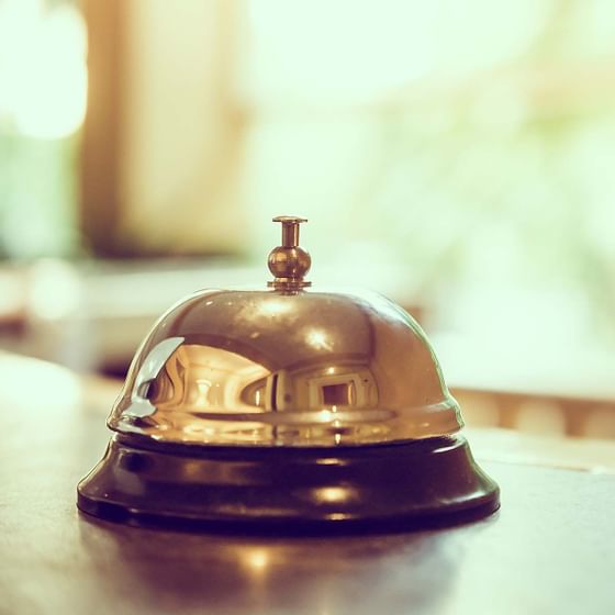 Close-up of a reception bell at Buenaventura Grand Hotel