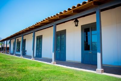 Exterior side view with wooden windows at NOI Blend Colchagua