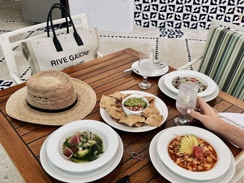 Closeup of a served lunch with various dishes at Los Cabos