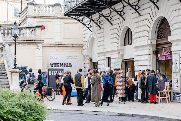 Vienna Design Week in Vienna with visitors outside an exhibition venue and historic architecture