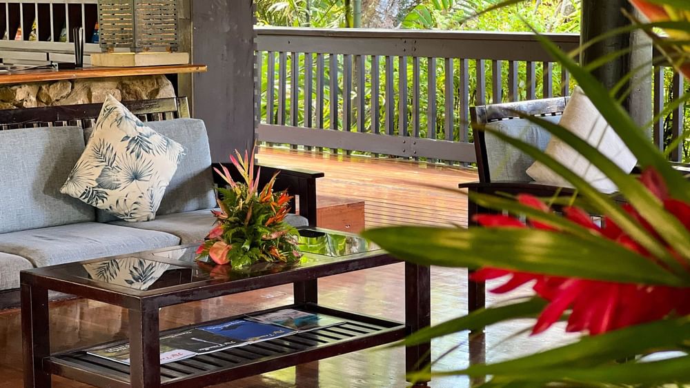Comfortable outdoor lounge area with tropical decor at The Naviti Resort in Korolevu.