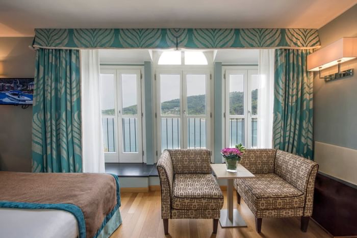 Sofa set inside bedroom-Grand Hotel Portovenere 
