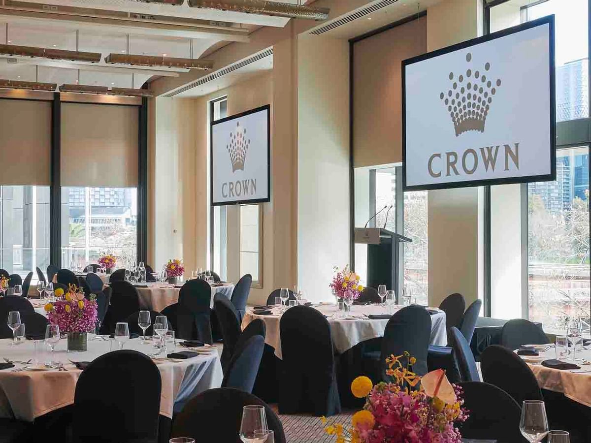 Banquet tables arranged in the Garden Room at Melbourne hotel