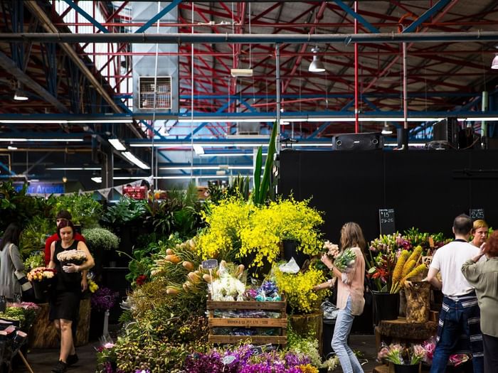 People shopping in Prahran Market near The Como Hotel Melbourne