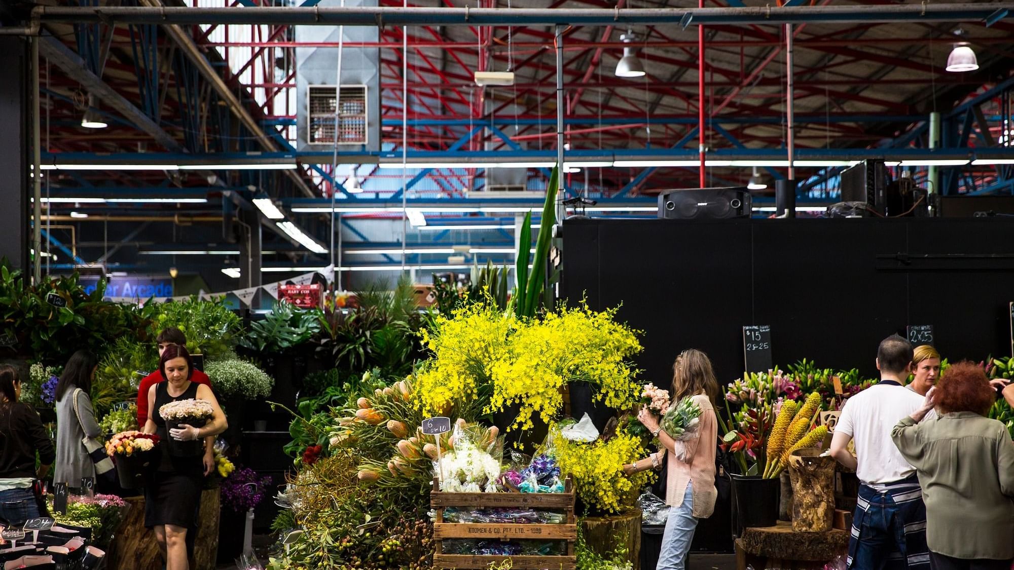 People shopping in Prahran Market near The Como Hotel Melbourne