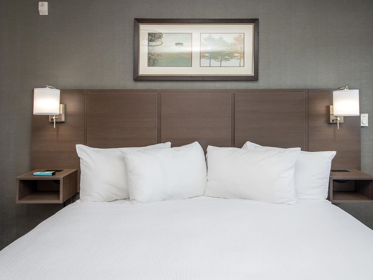 Suite with king bed and modern decor.