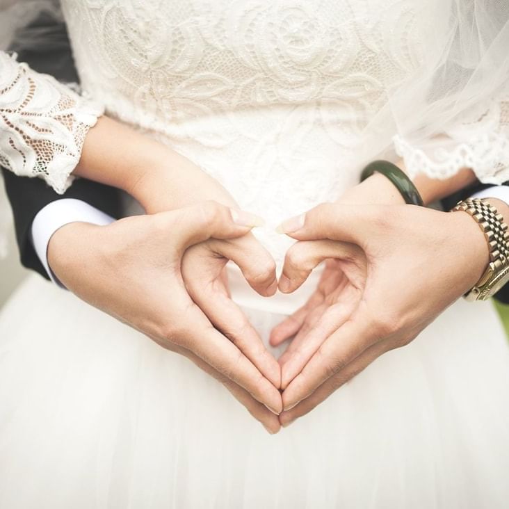 wedding couple holding hands in heart shape, Orsett Hall Hotel 