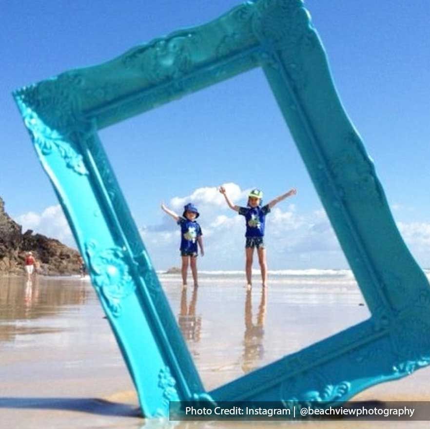 Creative Photography Tricks With A Photo Frame On The Beach