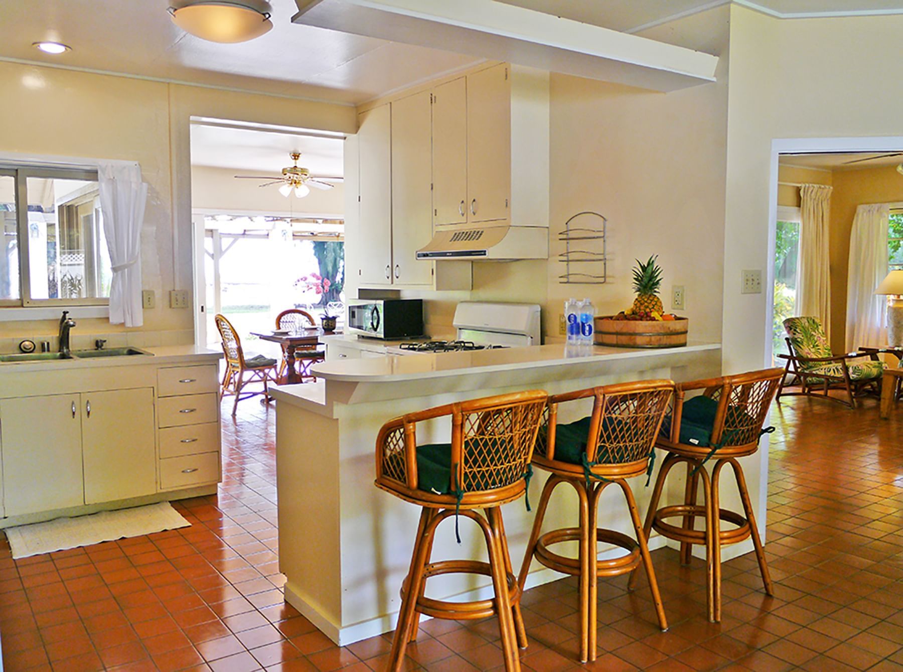 cottage kitchen with bar seating at Waimea Plantation Cottages