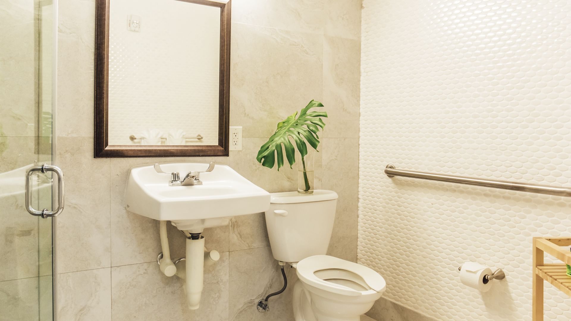 Vanity area in The ADA Luxury Suite bathroom at DOT Hotels
