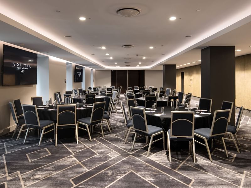 Adelaide room flexible meeting space with round tables and contemporary interior design